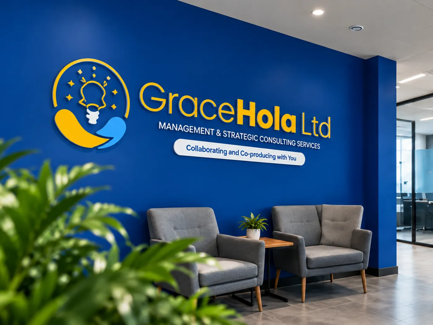GraceHola logo on the wall of a modern office reception